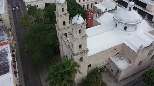 Aerial camera slowly turning to the left looking down on the towers and front of the Rectory Jesus (