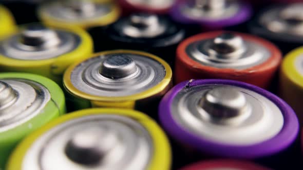 Lots of Alkaline Used AAA Batteries Background