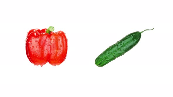 Red Bell Pepper and Fresh Cucumber with Clear Water Drops