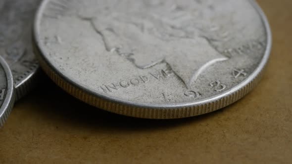 Rotating stock footage shot of antique American coins - MONEY 0094