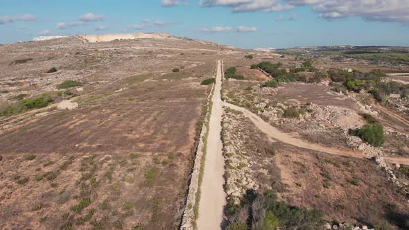 Aerial drone video from northern Malta near the Ghajn Znuber Tower.