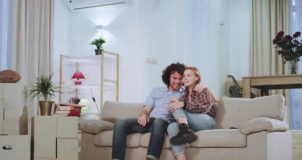 A Smiling and Excited Couple Enjoying the Time