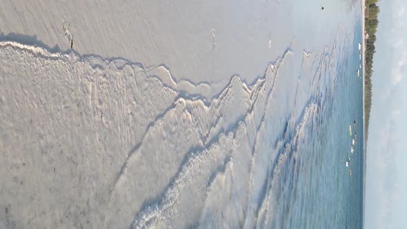 Vertical Video of the Ocean Near the Coast of Zanzibar Tanzania Aerial View