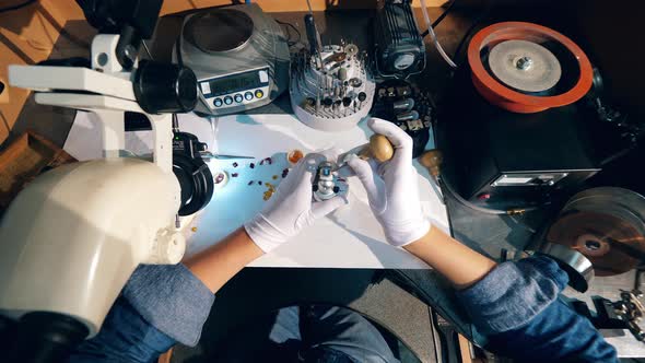 Top View of a Ring Getting Made By a Craftsman. Jeweler Working.