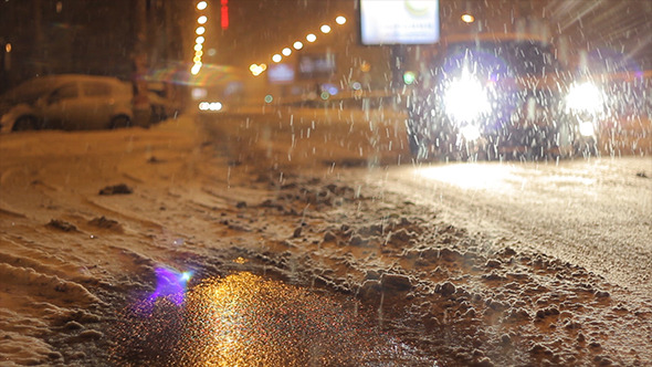 Snowy Night Street Traffic