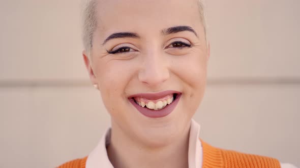 Portrait of Young Woman Looking at Camera