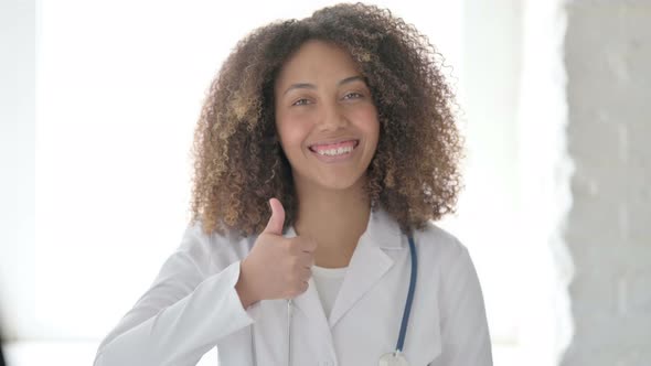 Afrcian Doctor showing Thumbs Up Sign