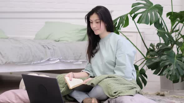 Teenage Girl Doing Homework on the Floor