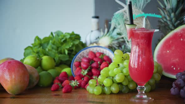 Wide shot of freshly made smoothies and tasty juicy fresh fruits. Healthy eating options.