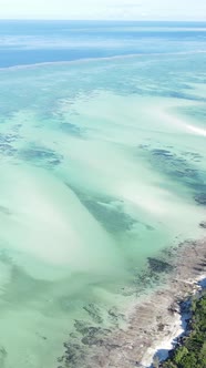 Tanzania  Vertical Video of the Ocean Near the Coast of Zanzibar Slow Motion