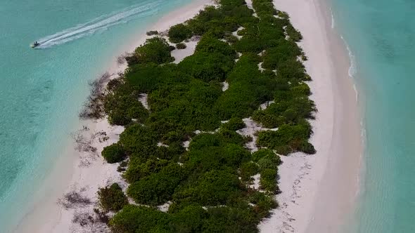 Aerial drone travel of lagoon beach by blue lagoon and sand background