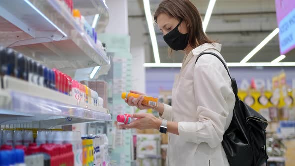 Woman Buyer Choosing Spray Antiperspirant