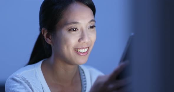 Woman watch on tablet computer at home