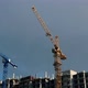 Construction site with cranes against a cloudy sky. TimeLaps. Construstion Concept - VideoHive Item for Sale