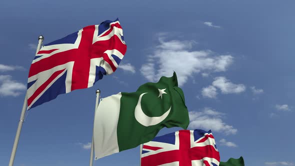 Waving Flags of Pakistan and the United Kingdom