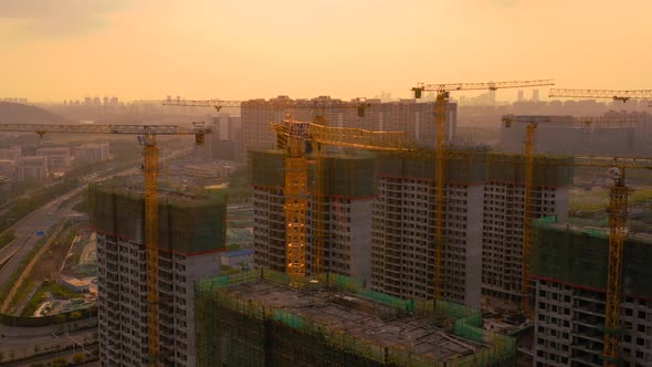 Aerial of construction site at sunset