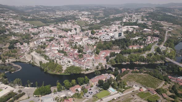 Birds eye view featuring parish townscape, tamega river and famous Sao Goncalo monastery.