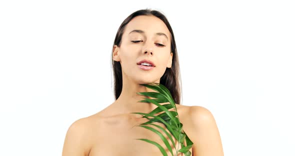 Woman with Palm Branch on White
