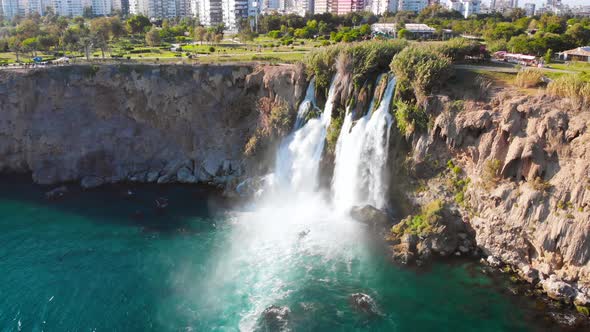 Top View of a High Waterfall Falling Into the Mediterranean Sea. Clean Ecology 