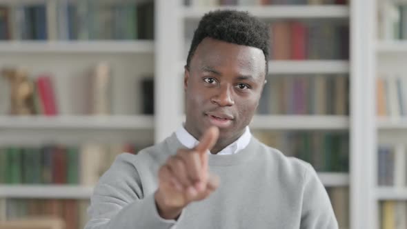 Portrait of African Man Pointing at the Camera and Inviting