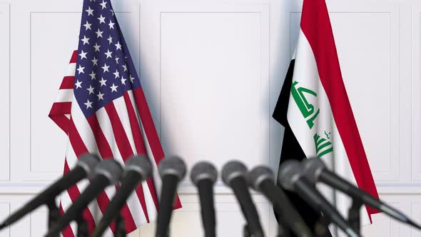 Flags of the United States and Iraq at International Meeting
