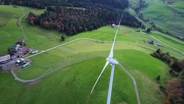 Aerial video of a wind turbine from above in Entlebuch, Switzerland