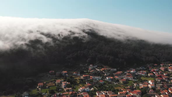 fairytale-like flight scene near a lenticular cloud formation near the village of Monte de Santa Tec