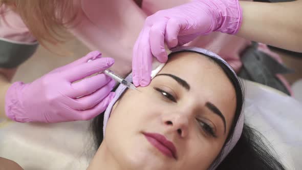 Young pretty woman receiving treatments in beauty salons.