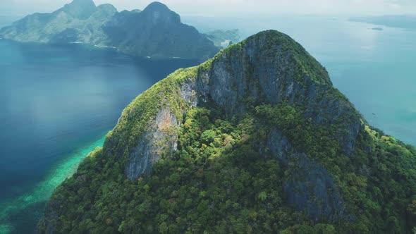 Philippines Tropic Green Forest on Mountain Top with Azure Seascape