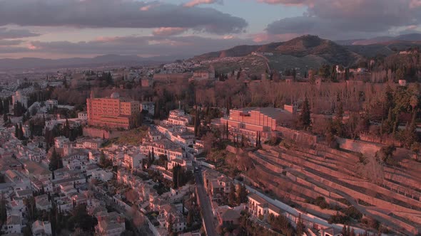 Aerial view of buildings at sunset