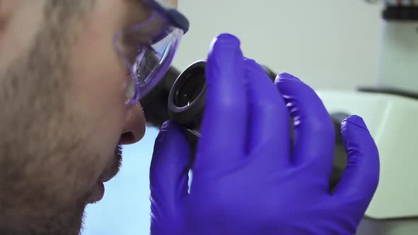Scientist Spin Adjusting Microscope Spbd