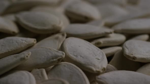 Cinematic, rotating shot of pumpking seeds - PUMPKIN SEEDS 041