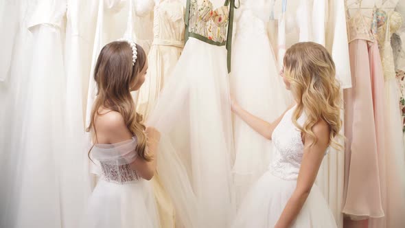 Two Young Women in Wedding Salon