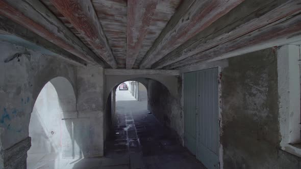 Under the Ancient Arcades of Chioggia