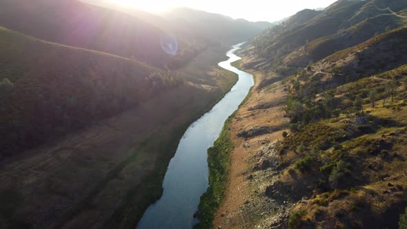 Aerial Flying Over a River in the Mountains of California