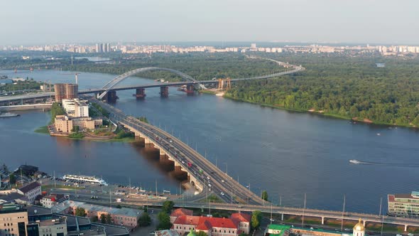 Top view of Podol. Many buildings and churches. Evening view of the river Dnipro.