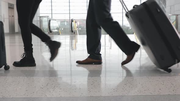 Travel People with Luggage Walking By Modern Architecture Design Airport