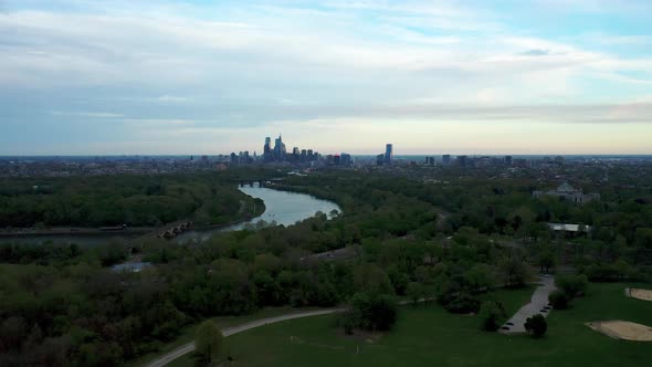 Aerial drone far away view of Philadelphia city skyline from Belmont Plateau including Schuylkill ri