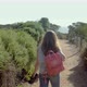 Rear view of young woman walking on footpath, Victoria , Australia - VideoHive Item for Sale