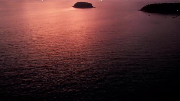 Orange Sunset with a View of the Sea and Island