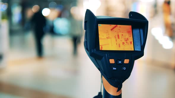 Thermovision Device Is Scanning Temperature in a Public Place