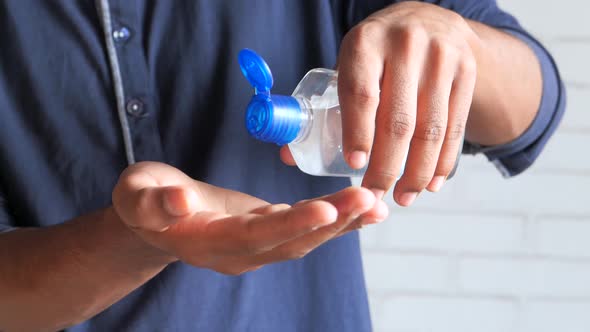 Using Sanitizer Liquid for Preventing Corona Virus