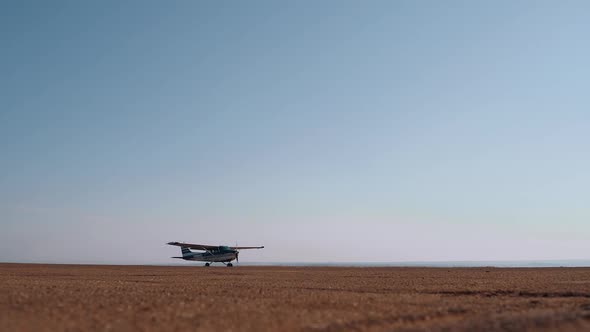 The Static Groundlevel Frame of a Helicopter That is Set in Motion on the Ground a Desert Frame on