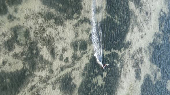 Zanzibar Tanzania  Vertical Video Kitesurfing Near the Shore of Ocean Slow Motion