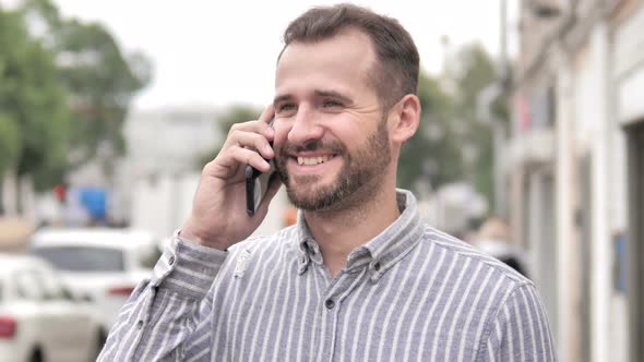 Outdoor Beard Casual Man Talking on Phone