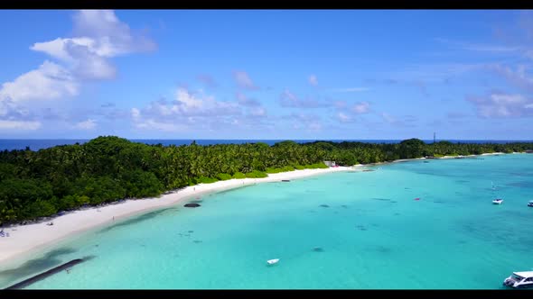 Aerial flying over sky of tranquil sea view beach time by blue lagoon and white sand background of a