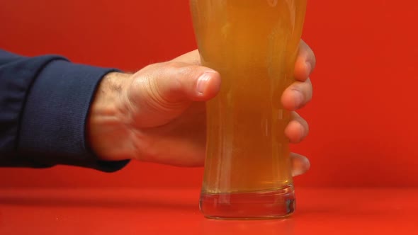 Man Drinking Glass of Light Cold Beer, Alcohol Addiction, Male Hand Close Up