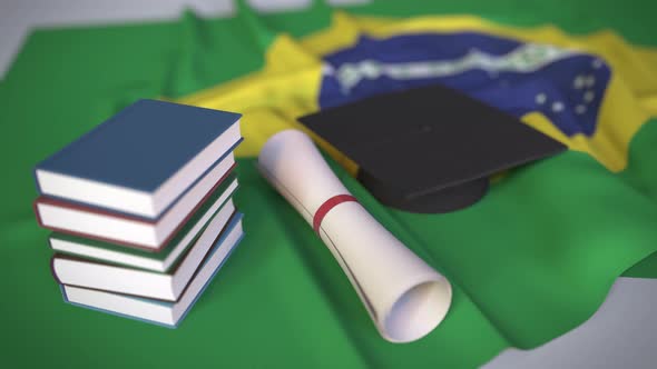 Graduation Cap and Diploma on Flag of Brazil