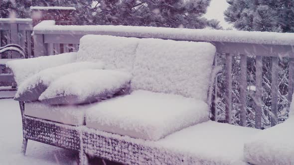 View of Spring snow storm from residential back porch.