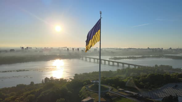 Ukrainian Flag in the Morning at Dawn. Aerial. Kyiv. Ukraine